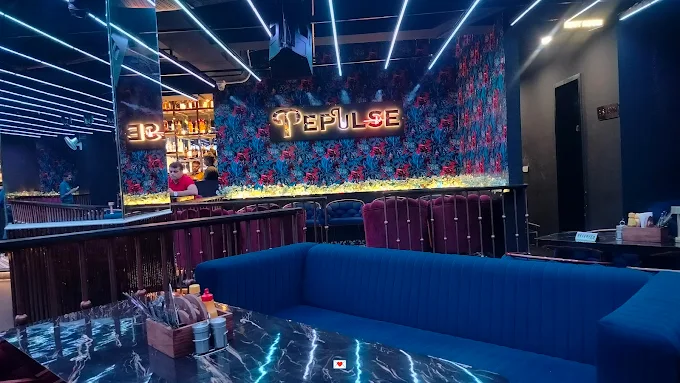Colorful dance floor and lounge seating at PePulse Jhansi