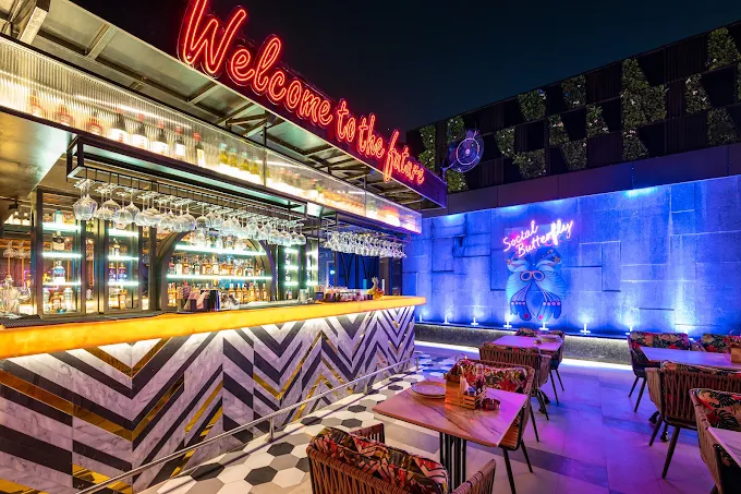 Dining and cocktail setup at Molecule Air Bar Kitchen Jhansi