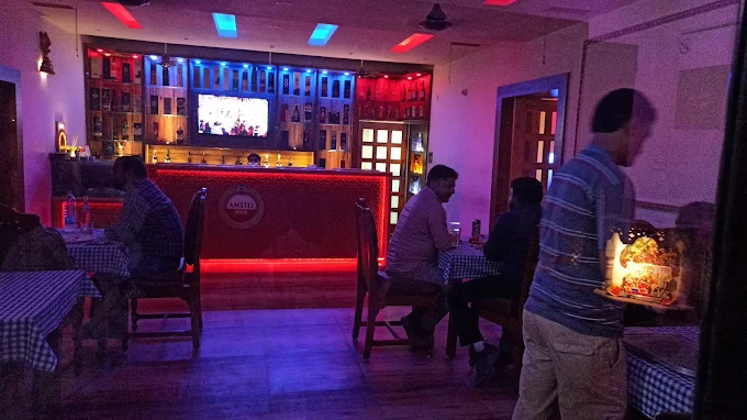 “Beer and snacks on table at Saqi Bar Jhansi”