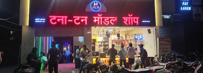 Party crowd enjoying drinks at Tana Tan Model Shop Jhansi
