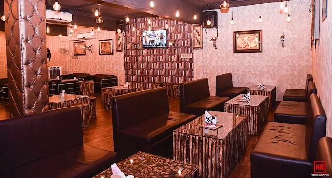 “Dark theme party ambience at Black Mud Jhansi